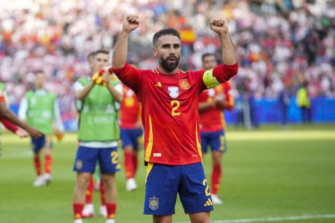 Spain's Dani Carvajal celebrates at the end of a Group B match between Spain and Croatia at the Euro 2024 soccer tournament in Berlin, Germany, Saturday, June 15, 2024. (AP Photo/Ebrahim Noroozi)