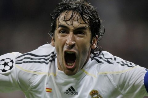 Real Madrid's Raul Gonzalez celebrates after scoring against AC Milan during a Group C champions League soccer match at the Santiago Bernabeu stadium in Madrid Wednesday Oct. 21, 2009. (AP Photo/Paul White)