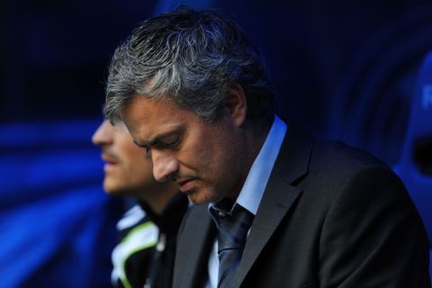 MADRID, SPAIN - APRIL 30: Head coach of Real Madrid Jose Mourinho looks down before the start of  the La Liga match between Real Madrid and Real Zaragona at Estadio Santiago Bernabeu on April 30, 2011 in Madrid, Spain.  (Photo by Denis Doyle/Getty Images)