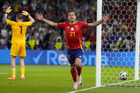 Spain's Mikel Oyarzabal celebrates after scoring his side's second goal during the final match between Spain and England at the Euro 2024 soccer tournament in Berlin, Germany, Sunday, July 14, 2024. (AP Photo/Manu Fernandez)