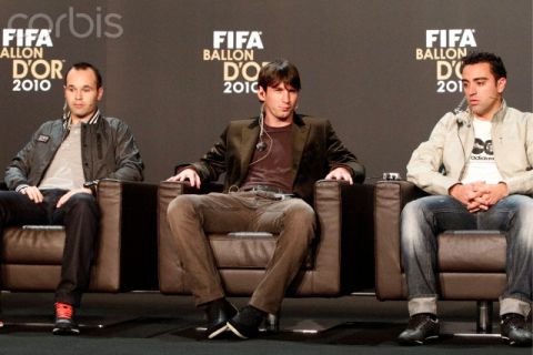 10 Jan 2011, Switzerland --- epa02523256 (from left) Spain's Andres Iniesta, Argentina's Lionel Messi and Spain's Xavi Hernandez during a news conference for the FIFA Ballon d'Or awarding ceremony in Zurich, Switzerland, 10 January 2011. All three players of FC Barcelona are nominated for the World Player of the Year award.  EPA/ALESSANDRO DELLA BELLA --- Image by © ALESSANDRO DELLA BELLA/epa/Corbis