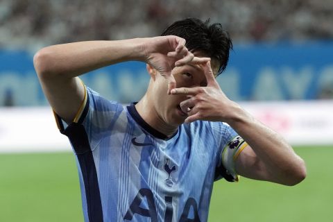 Tottenham's Son Heung-min reacts after making a goal during a friendly soccer match against Team K-league, Wednesday, 31, 2024, at Seoul World Cup Stadium in Seoul, South Korea. (AP Photo/Ahn Young-joon)