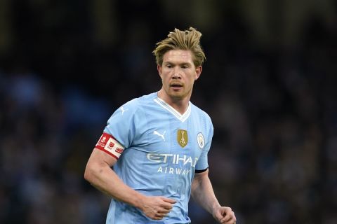 Manchester City's Kevin De Bruyne runs during the English FA Cup third round soccer match between Manchester City and Huddersfield Town, at the Etihad stadium in Manchester, England, Sunday, Jan. 7, 2024. (AP Photo/Dave Thompson)