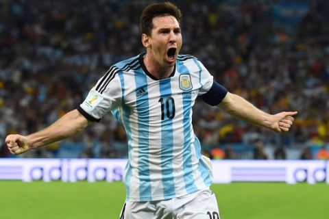 RIO DE JANEIRO, BRAZIL - JUNE 15:  Lionel Messi of Argentina celebrates after scoring his team's second goal during the 2014 FIFA World Cup Brazil Group F match between Argentina and Bosnia-Herzegovina at Maracana on June 15, 2014 in Rio de Janeiro, Brazil.  (Photo by Matthias Hangst/Getty Images)