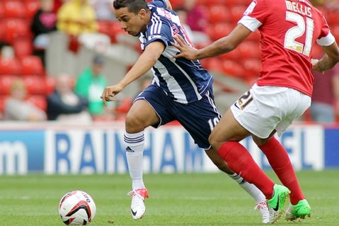 Football - Barnsley v West Bromwich Albion Pre Season Friendly  - Oakwell - 28/7/12
Yassine El Ghanassy of West Bromwich Albion (L) and Jacob Mellis of Barnsley in action
Mandatory Credit: Action Images / Ed Sykes
Livepic