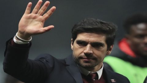 Braga's coach Abel Ferreira waves at the end of the Europa League round of 32 second leg soccer match between SC Braga and Olympique de Marseille at the Municipal stadium in Braga, Portugal, Thursday, Feb. 22, 2018. (AP Photo/Luis Vieira)