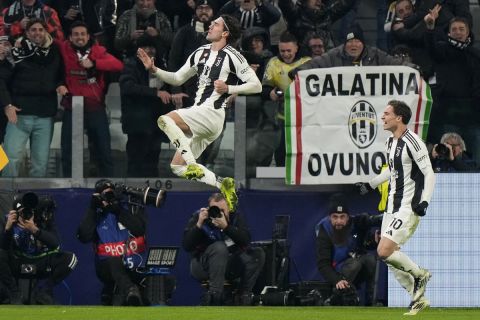 Juventus' Dusan Vlahovic celebrates after scoring his side's first goal during the Champions League, opening phase soccer match between Juventus and Manchester City at the Allianz stadium in Turin, Italy, Tuesday, Wednesday, Dec.11, 2024. (AP Photo/Luca Bruno)