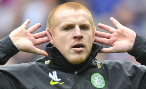 CELTIC MANAGER NEIL LENNON PRETENDS NOT TO HEAR THE RANGERS FANS CHANTS AT THE END OF THE MATCH AND SHOWS HIS DISSENT BY HOLDING HIS EARS. THE CELTIC MANAGER CALLED THIS "HUMOUR" DURING HIS POST MATCH PRESS CONFERENCE.      
RANGERS vs CELTIC. CLYDESDALE BANK SPL FIXTURE, IBROX STADIUM, GLASGOW. 
PICTURE COPYRIGHT © STUART WALLACE 2011.      
visit my website: www.stuartwallacepictures.com  