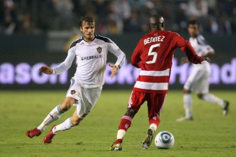 CARSON, CA - OCTOBER 24:  David Beckham #23 of the Los Angeles Galaxy pressures the play of Jair Benitez #5 of FC Dallas in the second half their MLS match on October 24, 2010 in Carson, California. The Galaxy defeated FC Dallas 2-1.  (Photo by Victor Decolongon/Getty Images)