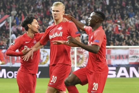 Salzburg's Erling Braut Haaland, second right, celebrates his goal before it is canceled by the video referee during the Champions League Group E soccer match between FC Red Bull Salzburg and Napoli in Salzburg, Austria, Wednesday, Oct. 23, 2019. (AP Photo/Kerstin Joensson)