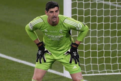 Real Madrid's goalkeeper Thibaut Courtois looks on during the Champions League final soccer match between Borussia Dortmund and Real Madrid at Wembley stadium in London, Saturday, June 1, 2024. (AP Photo/Dave Shopland)