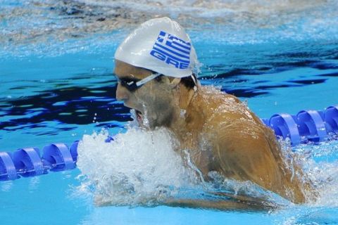 Greece's Ioannis Drymonakos competes in the heats of the men's 400-metre individual medley swimming event in the FINA World Championships at the indoor stadium of the Oriental Sports Center in Shanghai on July 31, 2011.   AFP PHOTO / PHILIPPE LOPEZ (Photo credit should read PHILIPPE LOPEZ/AFP/Getty Images)