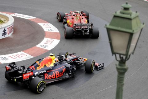 Red Bull driver Sergio Perez of Mexico, left, steers his car during the third free practice for Sunday's Formula One race, at the Monaco racetrack, in Monaco, Saturday, May 22, 2021. (AP Photo/Luca Bruno)