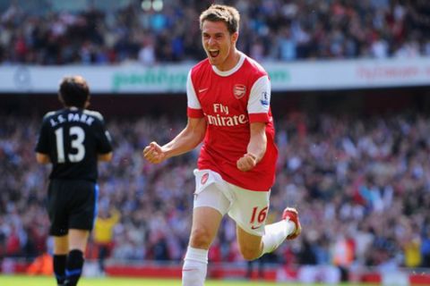 LONDON, ENGLAND - MAY 01:  Aaron Ramsey of Arsenal celebrates as he scores their first goal during the Barclays Premier League match between Arsenal and Manchester United at the Emirates Stadium on May 1, 2011 in London, England.  (Photo by Mike Hewitt/Getty Images)