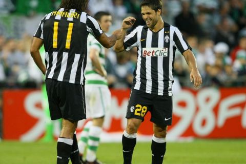 Juventus's Amauri De Oliveira (L) celebrates with teammate Diego Da Cunha (R) after scoring his second goal against the Shamrock Rover's during the third round Europa League match at Tallaght Stadium in Dublin, on July 29, 2010. AFP PHOTO/ PETER MUHLY (Photo credit should read PETER MUHLY/AFP/Getty Images)(Photo Credit should Read /AFP/Getty Images)