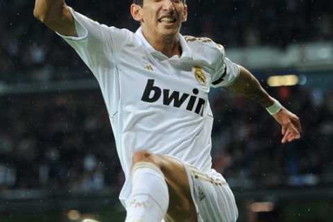 MADRID, SPAIN - OCTOBER 26: Angel Di Maria of Real Madrid celebrates scoring his sides third goal during the la Liga match between Real Madrid and Villarreal at the Estadio Santiago Bernabeu on October 26, 2011 in Madrid, Spain.  (Photo by Jasper Juinen/Getty Images)