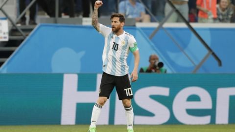 Argentina's Lionel Messi celebrates after scoring the opening goal for his team during the group D match between Argentina and Nigeria, at the 2018 soccer World Cup in the St. Petersburg Stadium in St. Petersburg, Russia, Tuesday, June 26, 2018. (AP Photo/Ricardo Mazalan)