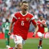 Russia's Denis Cheryshev celebrates after scoring his side's second goal during the group A match between Russia and Saudi Arabia which opens the 2018 soccer World Cup at the Luzhniki stadium in Moscow, Russia, Thursday, June 14, 2018. (AP Photo/Matthias Schrader)