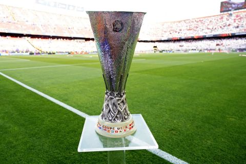 The trophy is displayed on the pitch before the Europa League final soccer match between Eintracht Frankfurt and Rangers FC at the Ramon Sanchez Pizjuan stadium in Seville, Spain, Wednesday, May 18, 2022. (AP Photo/Manu Fernandez)