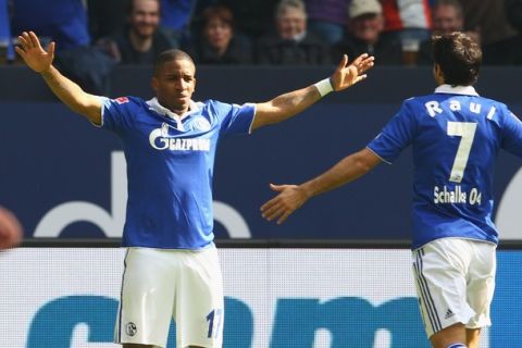 GELSENKIRCHEN, GERMANY - APRIL 08:  Jefferson Farfan of Schalke celebrates the first goal with Raul Gonzalez of Schalke during the Bundesliga match between FC Schalke 04 and Hanover 96 at Veltins Arena on April 8, 2012 in Gelsenkirchen, Germany.  (Photo by Christof Koepsel/Bongarts/Getty Images)