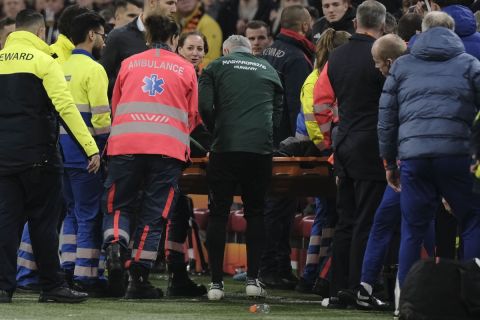 Medics carry Hungary's assistant coach Adam Szalai from the pitch during the UEFA Nations League soccer match between Netherlands and Hungary, at the Johan Cruyff ArenA, in Amsterdam, Netherlands, Saturday, Nov. 16, 2024. (AP Photo/Patrick Post)