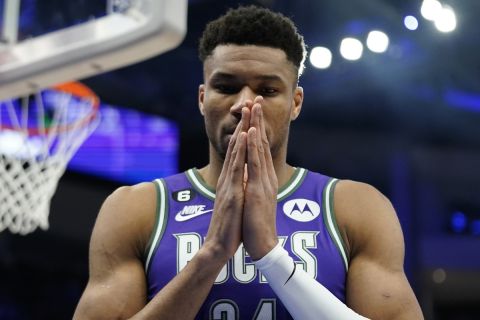 Milwaukee Bucks' Giannis Antetokounmpo pauses before an NBA basketball game against the Miami Heat Friday, Feb. 24, 2023, in Milwaukee. (AP Photo/Aaron Gash)