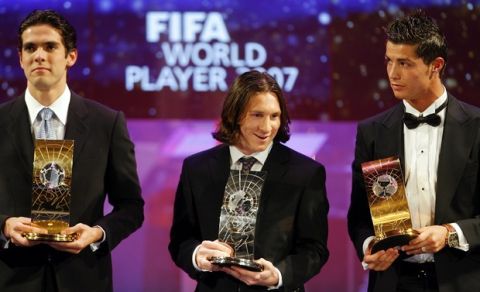 Soccer players Kaka, left, from Brazil, first placed, Argentinas Lionel Messi, center, second placed and Cristiano Ronaldo, right, from Portugal, third placed, pose with their trophies, during the 17th Fifa World Player Gala in Zurich, Switzerland, Monday, December 17, 2007. (KEYSTONE/Walter Bieri)