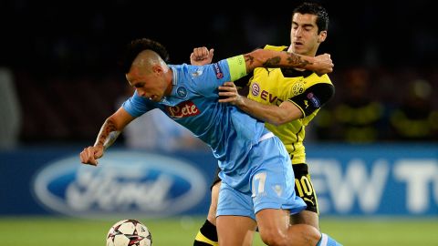 NAPLES, ITALY - SEPTEMBER 18:  Marek Hamsik of SSC Napoli is challenged by Henrikh Mkhitaryan of Borussia Dortmund during the UEFA Champions League Group F match between SSC Napoli and Borussia Dortmund at Stadio San Paolo on September 18, 2013 in Naples, Italy.  (Photo by Dennis Grombkowski/Bongarts/Getty Images)