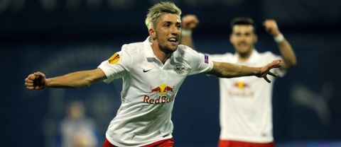 Salzburg's Kevin Kampl celebrates after scoring a goal  during the Europa League match between GNK Dinamo Zagreb  and FC Salzburg at Maksimiri stadium in Zagreb, on November 6, 2014.. AFP PHOTO /STRINGER        (Photo credit should read STR/AFP/Getty Images)