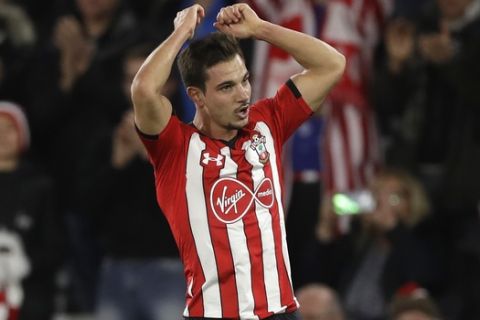 Southampton's Cedric Soares celebrates after scoring his side's second goal during the English Premier League soccer match between Southampton and Manchester United at St Mary's stadium in Southampton, England Saturday, Dec. 1, 2018. (AP Photo/Kirsty Wigglesworth)