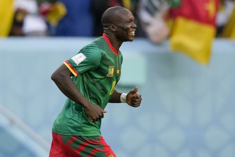 Cameroon's Vincent Aboubakar celebrates after scoring his side's second goal during the World Cup group G soccer match between Cameroon and Serbia, at the Al Janoub Stadium in Al Wakrah, Qatar, Monday, Nov. 28, 2022. (AP Photo/Frank Augstein)