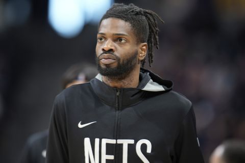 Brooklyn Nets center Nerlens Noel (0) in the first half of an NBA basketball game Sunday, March 12, 2023, in Denver. (AP Photo/David Zalubowski)