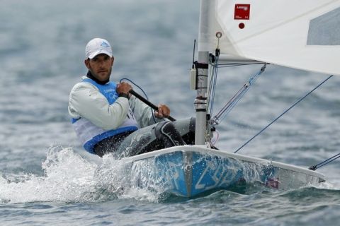 Cyprus' Pavlos Kontides sails in the sixth race of the men's Laser class at the London 2012 Olympic Games in Weymouth and Portland, southern England, August 1, 2012. REUTERS/Benoit Tessier (BRITAIN - Tags: SPORT YACHTING OLYMPICS)