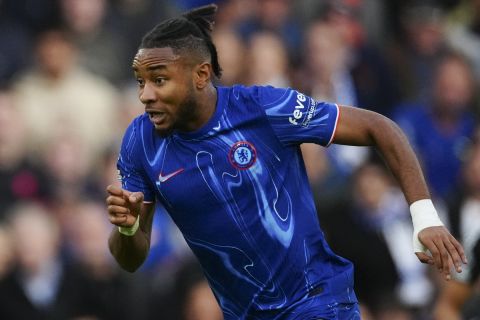 Chelsea's Christopher Nkunku runs with the ball during the English Premier League soccer match between Chelsea and Newcastle at Stamford Bridge in London, Sunday, Oct. 27, 2024. (AP Photo/Dave Shopland)