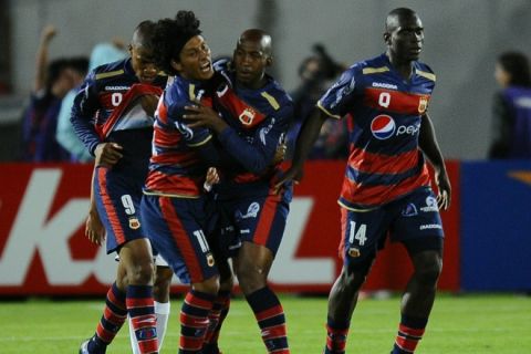 Ecuador's Quito Michael Quinonez (C) celebrates his goal against Argentina Independiente during their Copa Libertadores 2011 football match at  Olimpic stadium in Quito on February 1, 2011.  AFP PHOTO / RODRIGO BUENDIA (Photo credit should read RODRIGO BUENDIA/AFP/Getty Images)