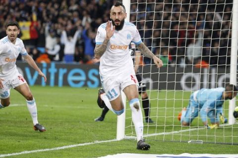 Marseille's Konstantinos Mitroglou, celebrates after his goal during the League One soccer match between Marseille and Lyon at the Velodrome stadium, in marseille, southern France , Sunday, March 18, 2018. (AP Photo/Claude Paris)