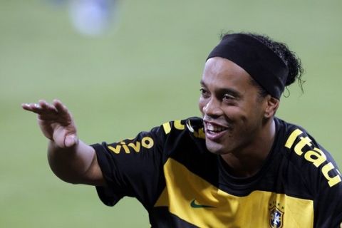 Brazilian soccer star Ronaldinho attends a training session in Doha on November 15, 2010 ahead of his team's friendly football match against Argentina on November 17 in the Gulf state. AFP PHOTO/KARIM JAAFAR (Photo credit should read KARIM JAAFAR/AFP/Getty Images)