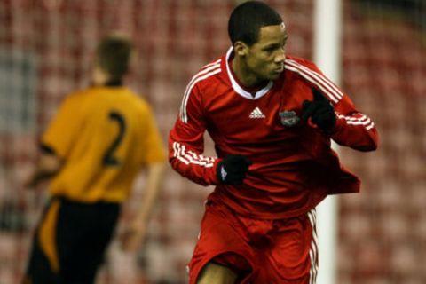 Liverpool's Tom Ince celebrates scoring the first goal