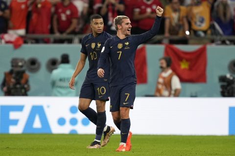 France's Antoine Griezmann, right, celebrates his goal that was later disallowed beside teammate Kylian Mbappe during the World Cup group D soccer match between Tunisia and France at the Education City Stadium in Al Rayyan , Qatar, Wednesday, Nov. 30, 2022. (AP Photo/Martin Meissner)