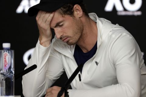 Britain's Andy Murray reacts during a press conference following his first round loss to Spain's Roberto Bautista Agut at the Australian Open tennis championships in Melbourne, Australia, Tuesday, Jan. 15, 2019. (AP Photo/Kin Cheung)