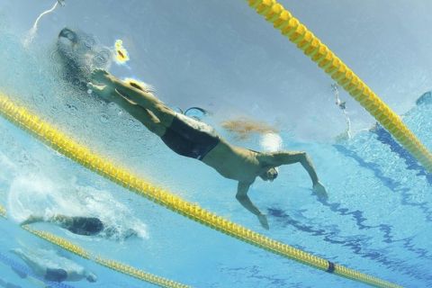 Ioannis Drymonakos of Greece is seen from underwater as he swims in the men's 200m butterfly heats at the European Swimming Championships in Budapest  August 11, 2010.                           REUTERS/Wolfgang Rattay (HUNGARY  - Tags: SPORT SWIMMING)  