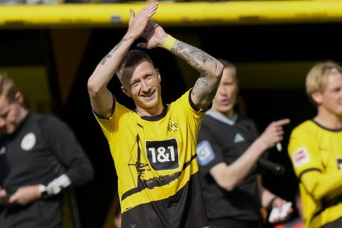 Dortmund's Marco Reus leaves the pitch during the German Bundesliga soccer match between Borussia Dortmund and Augsburg, in Dortmund, Saturday, May 4, 2024. (AP Photo/Martin Meissner)