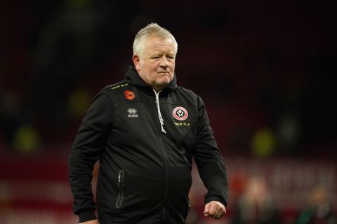 Sheffield United's head coach Chris Wilder leaves the field at the end of the English Premier League soccer match between Manchester United and Sheffield at the Old Trafford Stadium in Manchester, England, Wednesday, April 24, 2024. Manchester United won 4-2. (AP Photo/Dave Thompson)