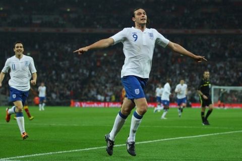 LONDON, ENGLAND - MARCH 29:  Andy Carroll of England celebrates as he scores their first goal during the international friendly match between England and Ghana at Wembley Stadium on March 29, 2011 in London, England.  (Photo by Julian Finney/Getty Images)