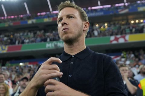 Germany's head coach Julian Nagelsmann arrives on the pitch before a Group A match between Germany and Scotland at the Euro 2024 soccer tournament in Munich, Germany, Friday, June 14, 2024. (AP Photo/Ariel Schalit)