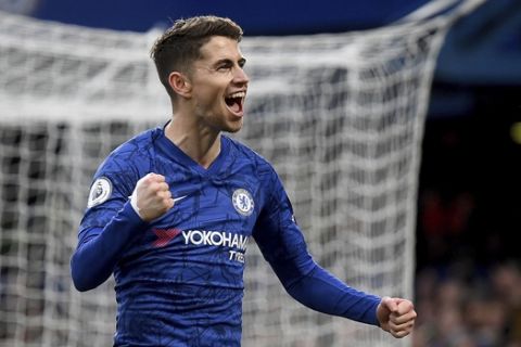 Chelsea's Jorginho celebrates scoring his side's first goal of the game, during the English Premier League soccer match between Chelsea and Burnley at Stamford Bridge, in London, Saturday, Jan. 11, 2020. (Victoria Jones/PA via AP)