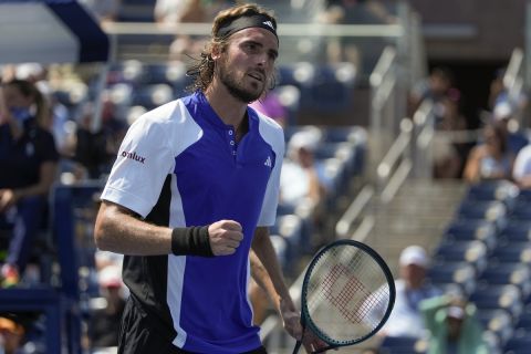 Stefanos Tsitsipas, of Greece, reacts after scoring a point against Thanasi Kokkinakis, of Australia,during the first round of the U.S. Open tennis championships, Tuesday, Aug. 27, 2024, in New York. (AP Photo/Pamela Smith)