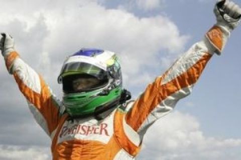 Force India driver Giancarlo Fisichella of Italy jubilates as he qualifies for pole position ahead of Belgium's Formula One Grand Prix at the Spa-Francorchamps circuit, Saturday, Aug. 29, 2009. (AP Photo/Yves Logghe)