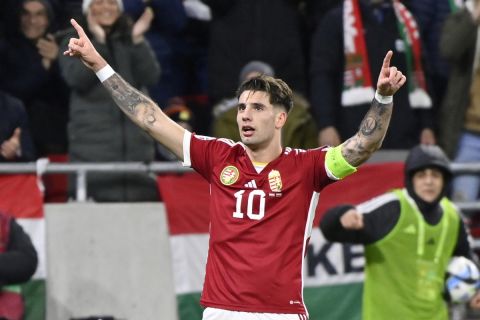 Dominik Szoboszlai of Hungary celebrates after scoring his team's second goal during the Euro 2024 group G qualifying soccer match between Hungary and Bulgaria at the Puskas Arena stadium in Budapest, Hungary, Monday, March 27, 2023. (AP Photo/Denes Erdos)