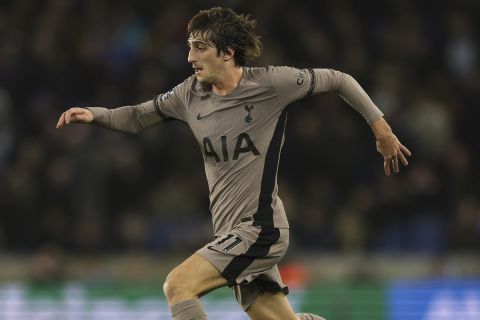 Tottenham's Bryan Gil runs with the ball during the English Premier League soccer match between Brighton & Hove Albion and Tottenham Hotspur at the Amex stadium in Brighton, England, Thursday, Dec. 28, 2023. (AP Photo/Ian Walton)